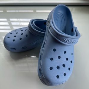 Light blue crocs, no tags but never been worn